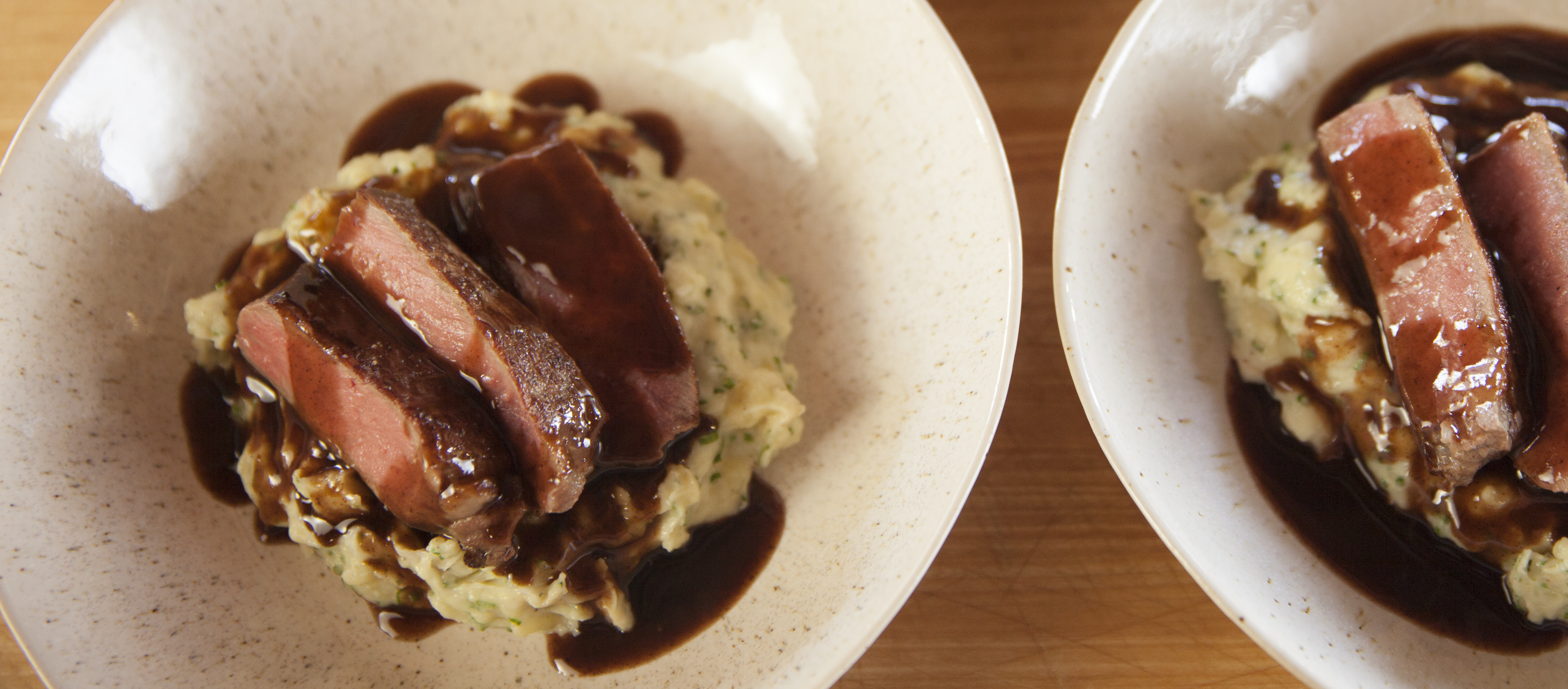 sous-vide-steak-with-red-wine-sauce-and-smashed-potatoes__hero-image.jpg