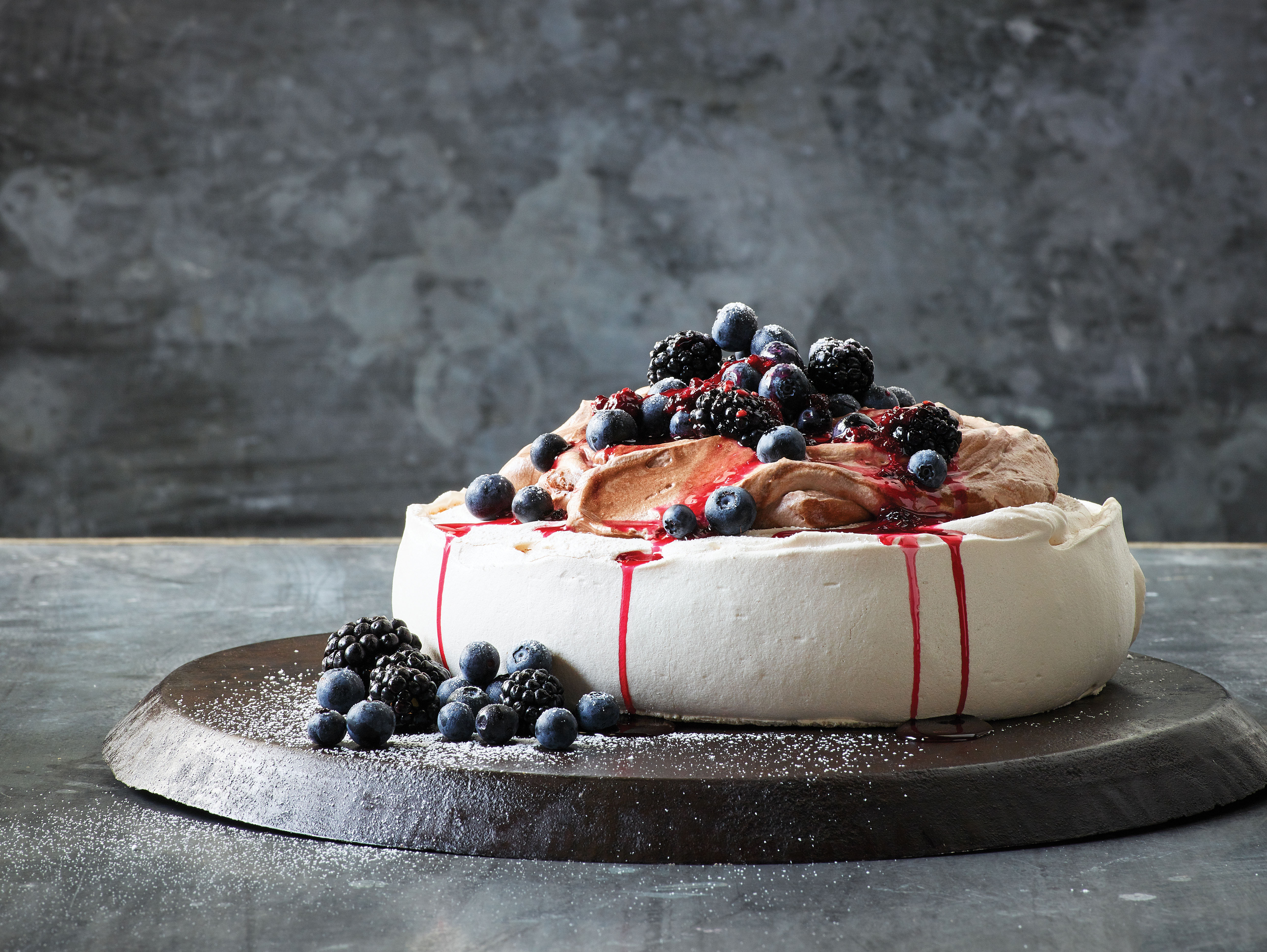 Pavlova with Chocolate Cream and Berries