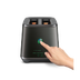 A hand reached out to press a button of the Eye Q™ Auto 2 Slice