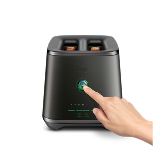 A hand reached out to press a button of the Eye Q™ Auto 2 Slice