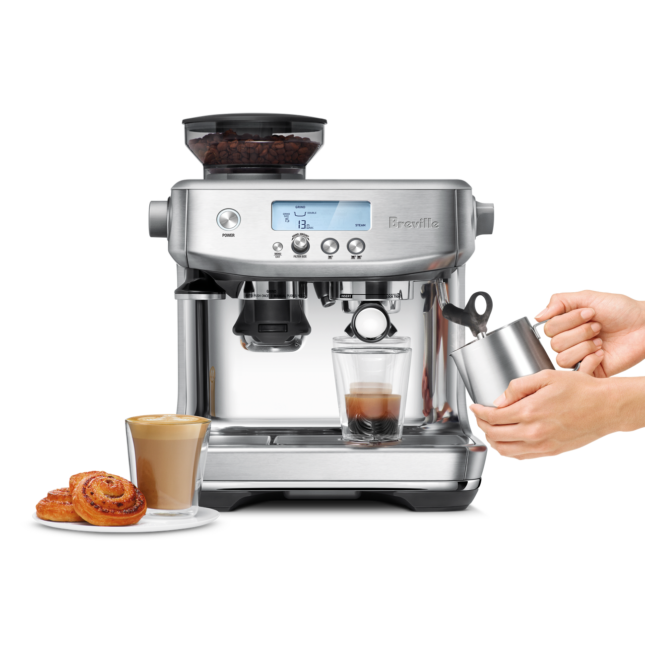 the Barista Pro™ with milk jug, coffee and pastries.