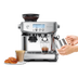 the Barista Pro™ with milk jug, coffee and pastries.