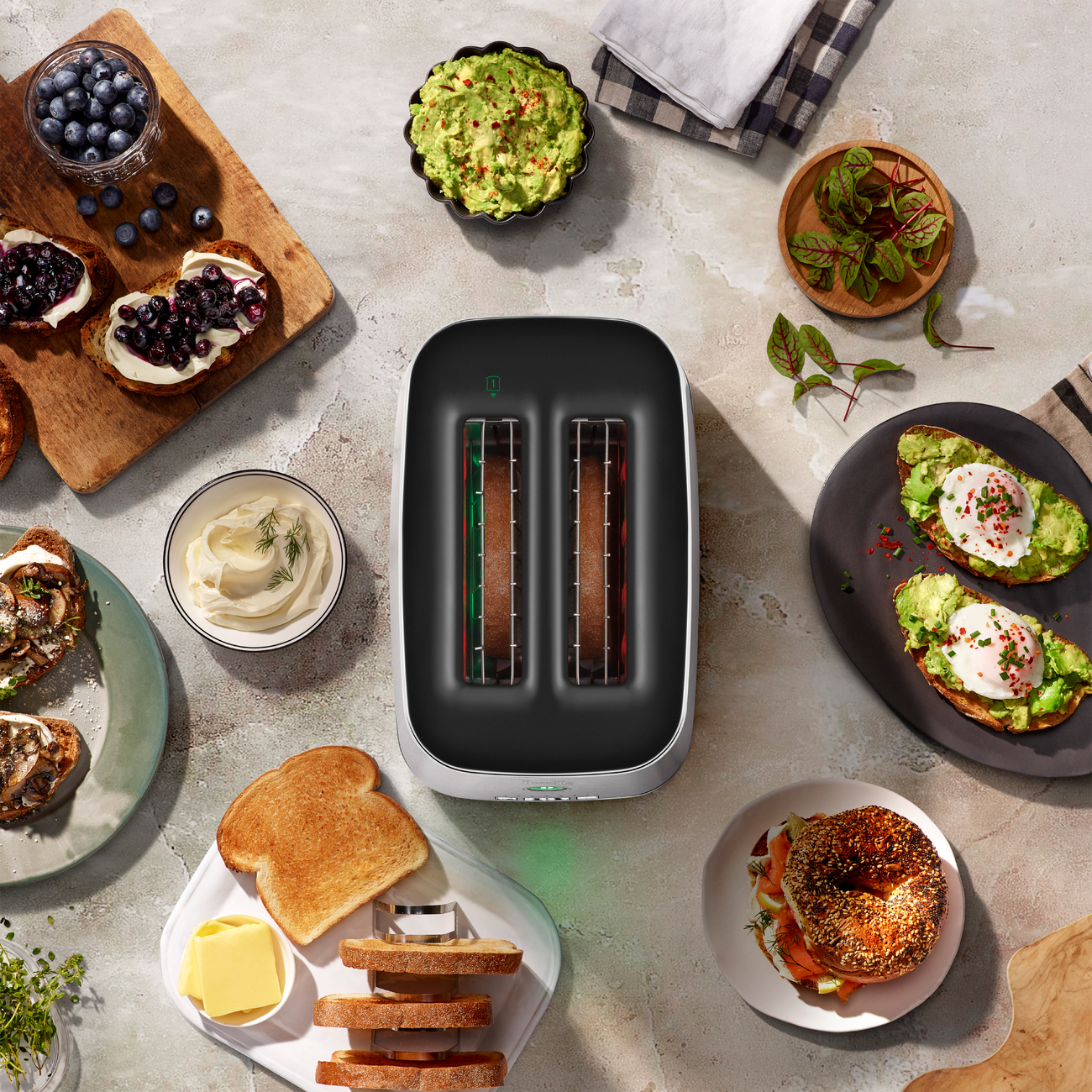 Lifestyle image of the Eye Q™ Auto 2 Slice in colour Brushed Stainless Steel