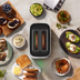 Lifestyle image of the Eye Q™ Auto 2 Slice in colour Brushed Stainless Steel