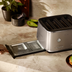 Lifestyle image of the Eye Q™ Auto 4 Slice in colour Brushed Stainless Steel