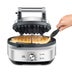 Person removing waffle from the non stick waffle maker.